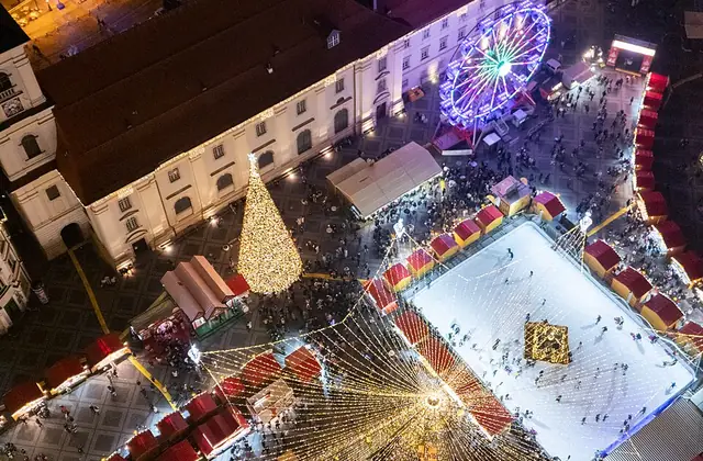 An aerial view of Sibiu Christmas Market and its illuminated stalls