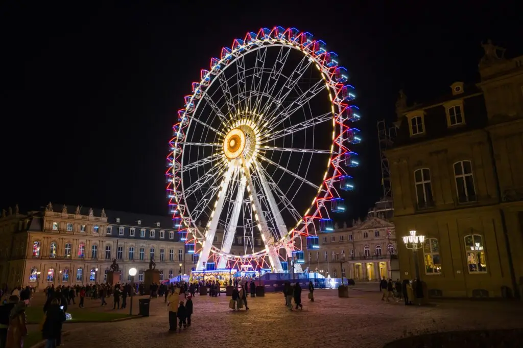 Stuttgart Christmas Market with wooden stalls, lights and Glühwein in the historic city center of Stuttgart, Germany.