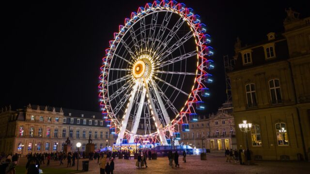 Stuttgart Christmas Market with wooden stalls, lights and Glühwein in the historic city center of Stuttgart, Germany.